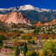 At 6,000-foot elevation, Colorado Springs, at the foot of the Rockies, boasts both crisp mountain air and sunny skies. Hike glacier-carved Pikes Peak, go golfing, or enjoy a picnic in the park. Don’t miss the red sandstone formations in the Garden of the Gods.