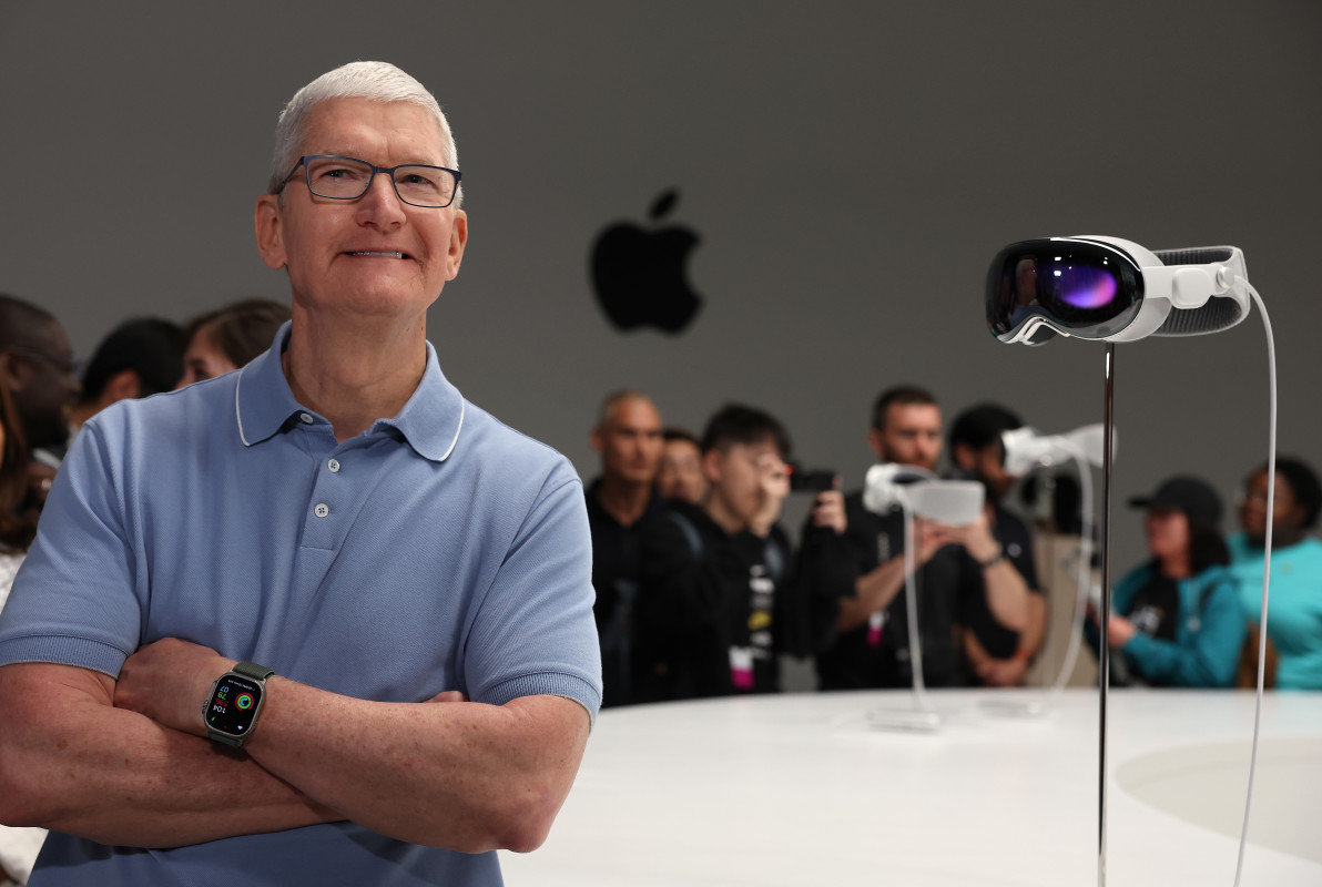 Tim Cook says there are more than 900 million Apple service