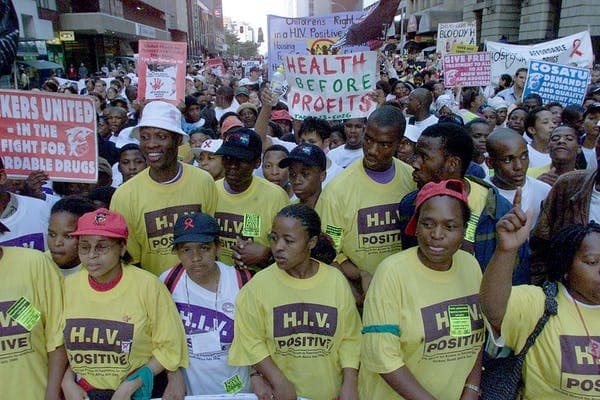 Demonstrators in Durban, South Africa, demand lower priced HIV drugs outside the 2000 international AIDS conference. Yoav Lemmer/AFP via Getty Images