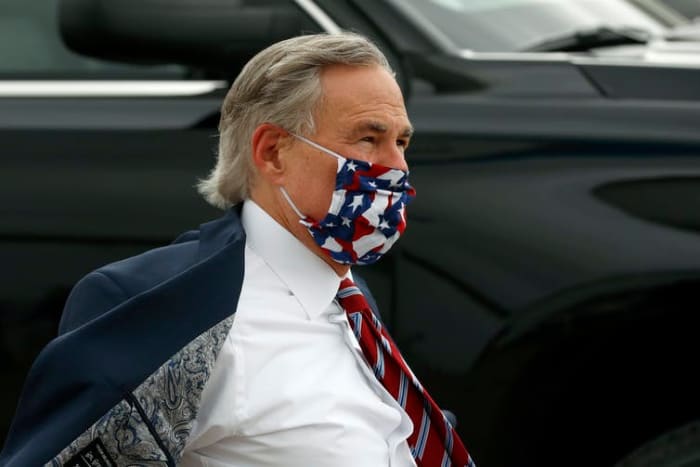 Texas Gov. Greg Abbott, who initially blocked cities from enforcing mask orders, changed his messaging after COVID-19 cases spiked in his state. Many residents had shunned mask-wearing before he shifted to promoting and then requiring it. AP Photo/Tony Guitierrez