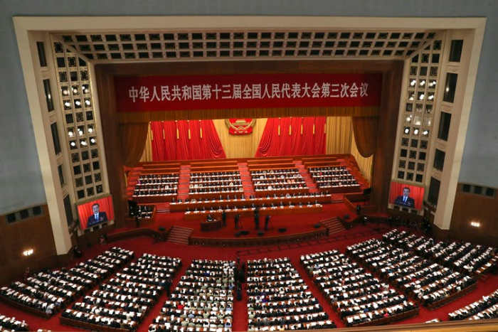 The Chinese premier delivers the government work report at the Great Hall of the People in Beijing. AP Photo/Ng Han Guan, Pool