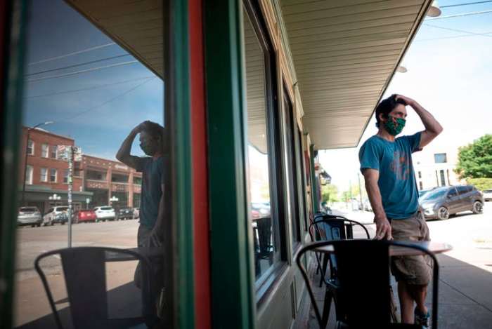 Stillwater, Oklahoma, pulled back on requiring people to wear masks in stores last spring after officials said some customers threatened store employees. Johannes Eisele/AFP via Getty