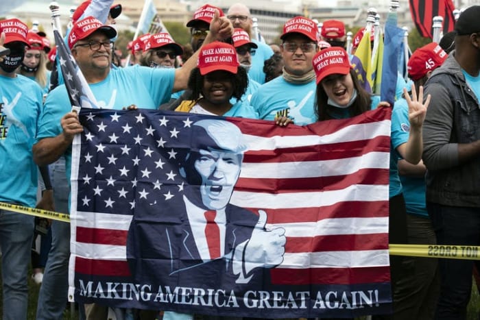 Trump supporters selected to attend his campaign rally at the White House on October 10, 2020. Jose Luis Magana/AP