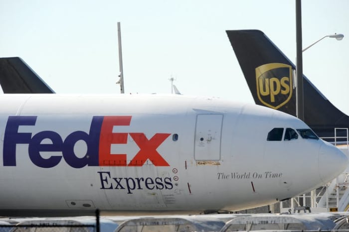 Companies like UPS are already gearing up to store and transport a vaccine. AP Photo/Erik S. Lesser