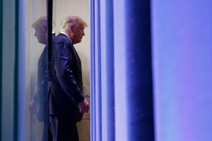 President Trump leaves a Nov. 5, 2020, press conference at which he alleged the election had been rigged and stolen. Chip Somodevilla/Getty Images