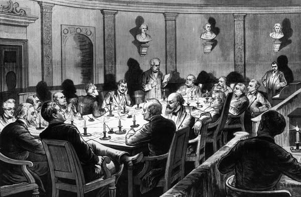 The Electoral Commission of 1877 holds a secret session by candlelight in Washington, D.C., to decide the 1876 presidential election. From Frank Leslie's Illustrated Newspaper. Photo by MPI/Getty Images
