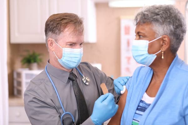 Surveys suggest up to 40% of Americans may refuse to receive the COVID-19 vaccine. fstop123 via Getty Images