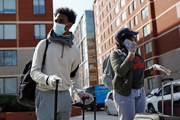 When universities closed their dorms during the coronavirus outbreak, it meant breaking contracts with students. Many schools, including Howard University, shown here, have agreed to pay partial refunds. AP Photo/Patrick Semansky