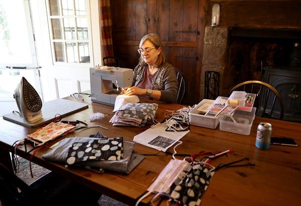 The CDC now recommends everyone wear cloth masks to protect against spreading coronavirus. A group of New Jersey residents has started sewing masks in their homes. Elsa/Getty Images