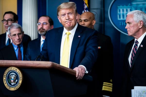 President Trump’s early discounting of the danger of the coronavirus may have stalled action by Republican governors. Jabin Botsford/The Washington Post via Getty Images