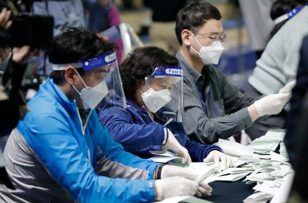 South Korea was able to hold a national election on April 15, because it has been successful in containing the spread of COVID-19. AP Photo/Lee Jin-man