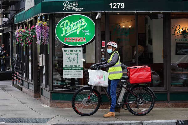 Many restaurants, such as Patsy’s in New York City, are delivering through the coronavirus lockdown, but people miss the social aspects of dining in. Cindy Ord/Getty Images