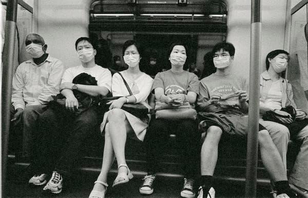 From 2003, in Hong Kong, people riding the subway during the SARS outbreak. Getty Images / xPacifica