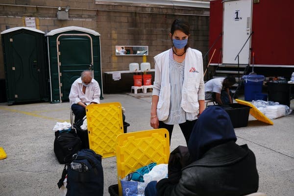 Doctors Without Borders set up showers to combat COVID-19 for people living on the streets, New York, May 2020. Spencer Platt/Getty Images