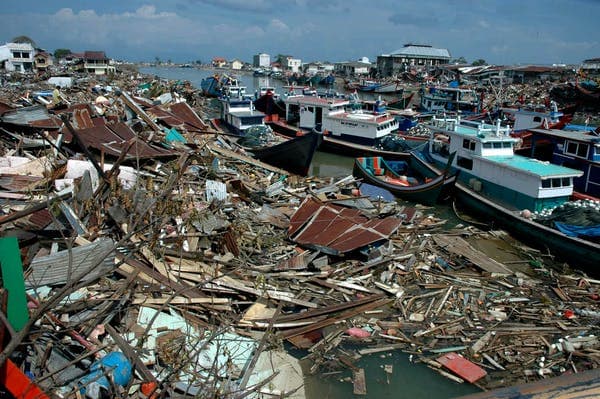 Banda Aceh, Indonesia, after the 2004 tsunami: the impact of disaster is not felt equally by all. www.shutterstock.com