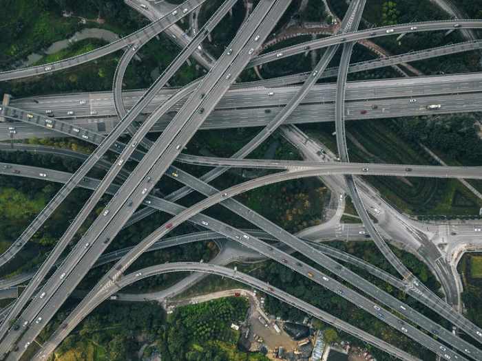 Modern supply chains resemble a massive set of intertwined highways more than a simple conveyer belt. AerialPerspective Works/iStock via Getty Images