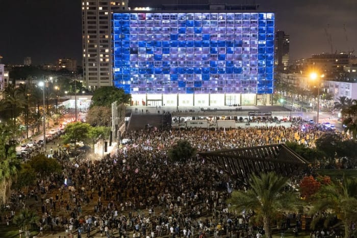Thousands of people take part in spontaneous celebrations in Rabin Square in Tel Aviv, Israel, after the Knesset voted on June 13, 2021, to oust longtime Prime Minister Benjamin Netanyahu. Guy Prives/Getty Images