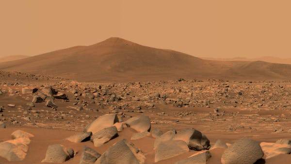 Nasa’s Perseverance Mars rover used its dual-camera Mastcam-Z imager to capture this image. a hill about 2.5km away. NASA/JPL-Caltech/ASU/MSSS