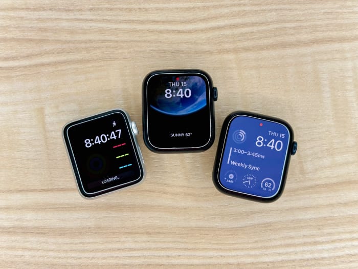 From left to right: Apple Watch Series 3, Apple Watch SE (second-gen), and Apple Watch Series 8.