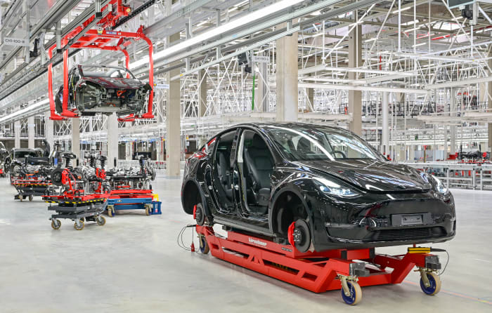 09 October 2021, Brandenburg, Grünheide: A Tesla Model Y is seen in a production hall of the Tesla Gigafactory during the open day. In Grünheide, east of Berlin, the first vehicles are to roll off the production line from the end of 2021. The US company plans to build around 500,000 Model Ys here every year. Photo: Patrick Pleul/dpa-Zentralbild/ZB (Photo by Patrick Pleul/picture alliance via Getty Images)
