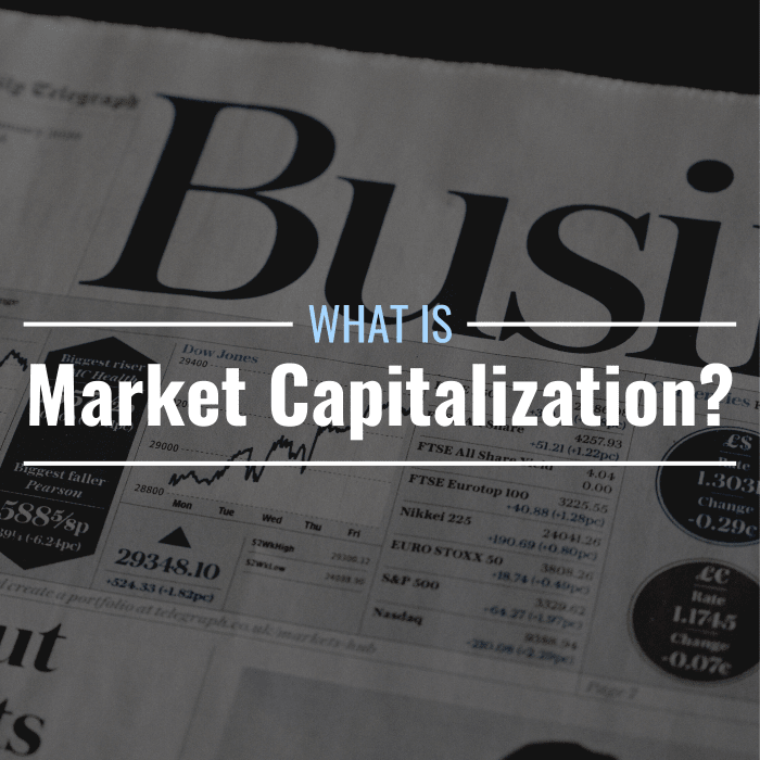 Darkened photo of a business/finance newspaper with text overlay that reads 