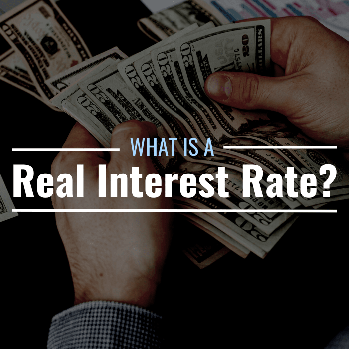 Photo of a cash being counted with text overlay with the text "What is a real interest rate?"