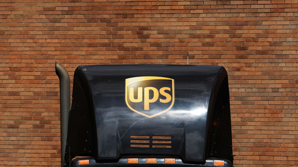 UPS Plans Management Buyouts in Bid to Trim Payroll Costs