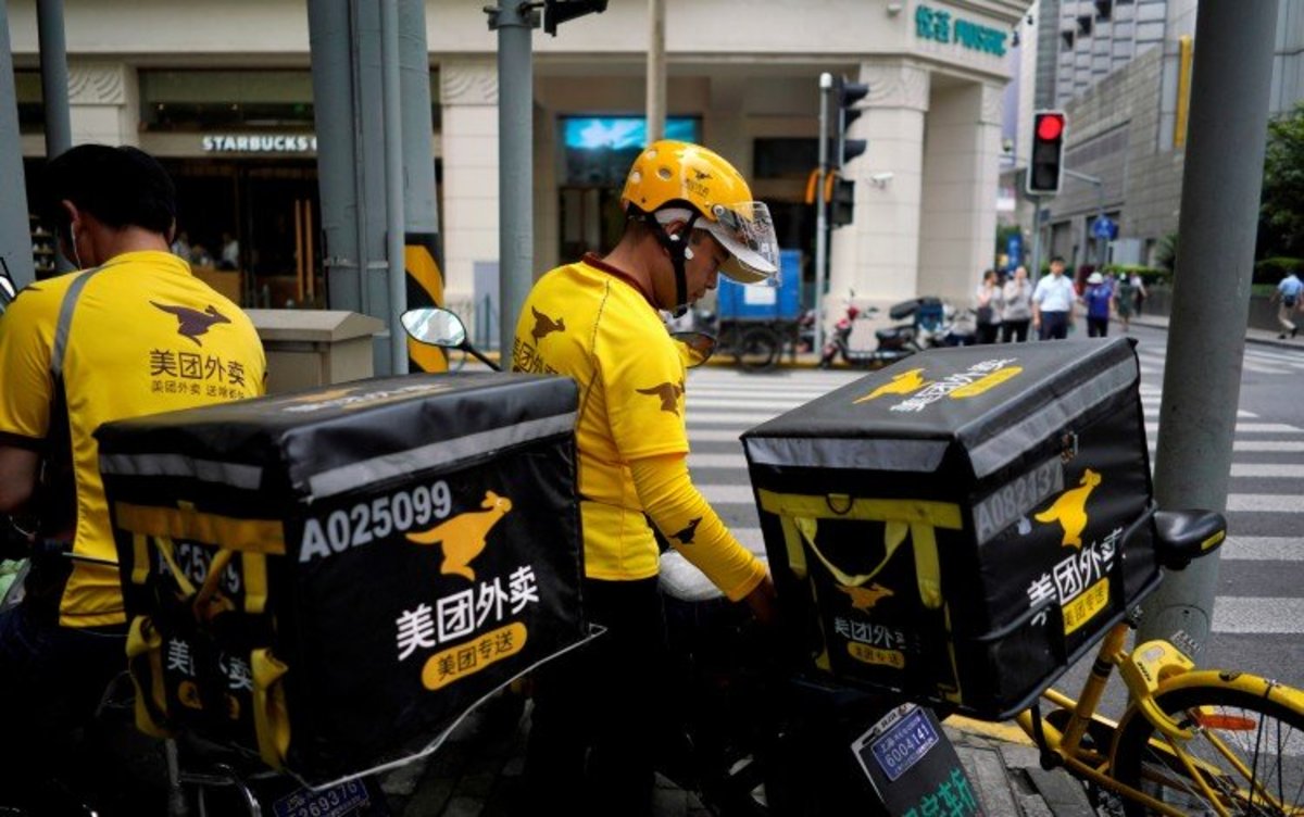 Uber, Lyft, DoorDash Drop; Biden Aide Wants to Reclassify Gig Workers TheStreet