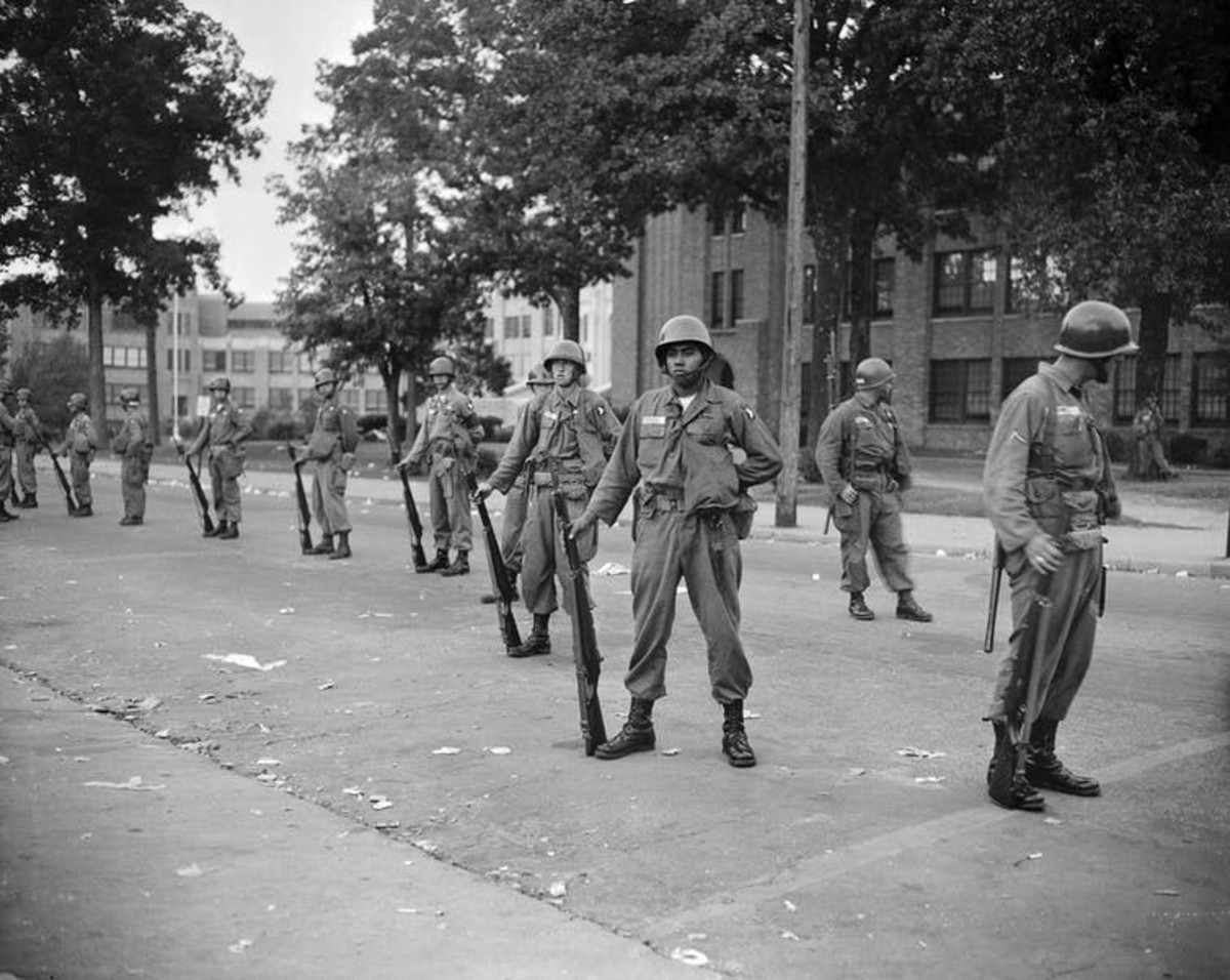 Federal troops were sent by President Dwight Eisenhower to Little Rock, Ark., in 1957 to protect Black students from mob violence when they integrated a city high school. Bettmann/Getty