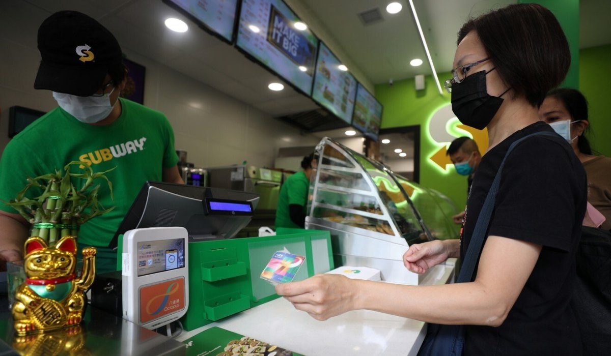 A customer uses their Octopus card at a Subway shop in Quarry Bay. Photo: Xiaomei Chen