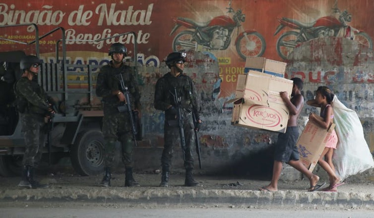 Brazilian soldiers and federal police patrolled Rio’s poor ‘favela’ neighborhoods to secure the city before the 2014 Olympics. Mario Tama/Getty Images
