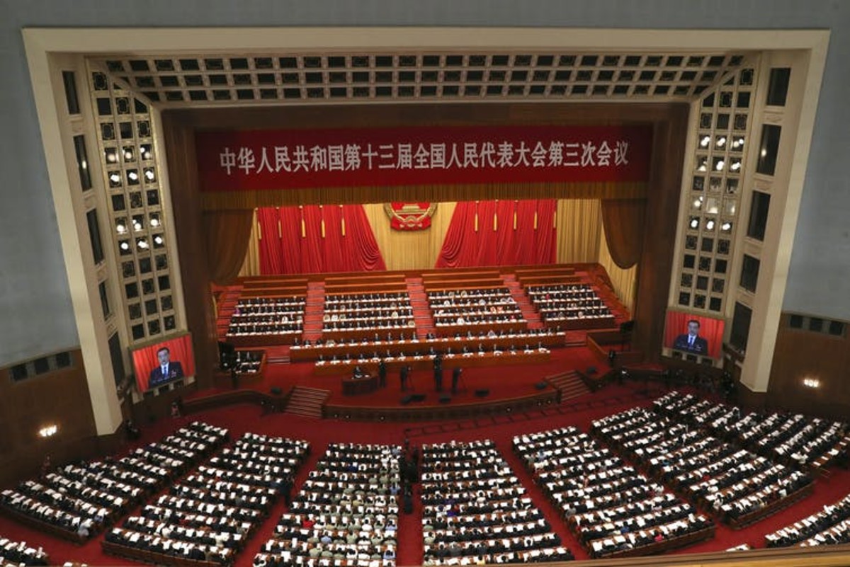 The Chinese premier delivers the government work report at the Great Hall of the People in Beijing. AP Photo/Ng Han Guan, Pool
