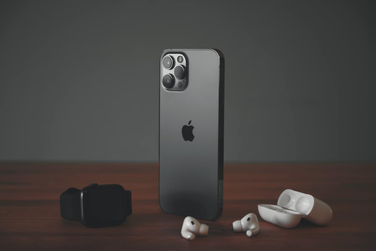 Figure 1: Apple's iPhone 13, Apple Watch and AirPods Pro.