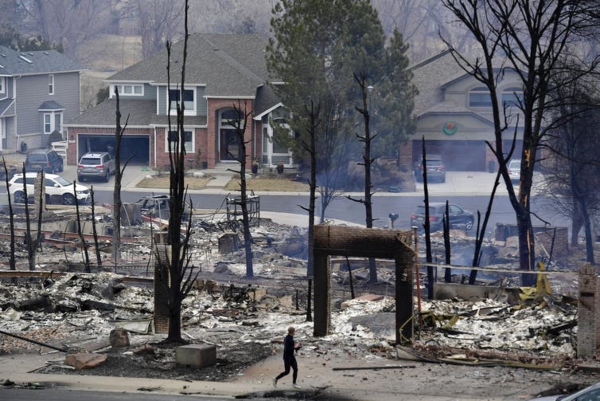 Nearly 1,000 homes burned in Boulder County, Colo., as strong winds whipped a grass fire through unusually dry landscape on Dec. 30, 2021. Helen H. Richardson/MediaNews Group/The Denver Post via Getty Images