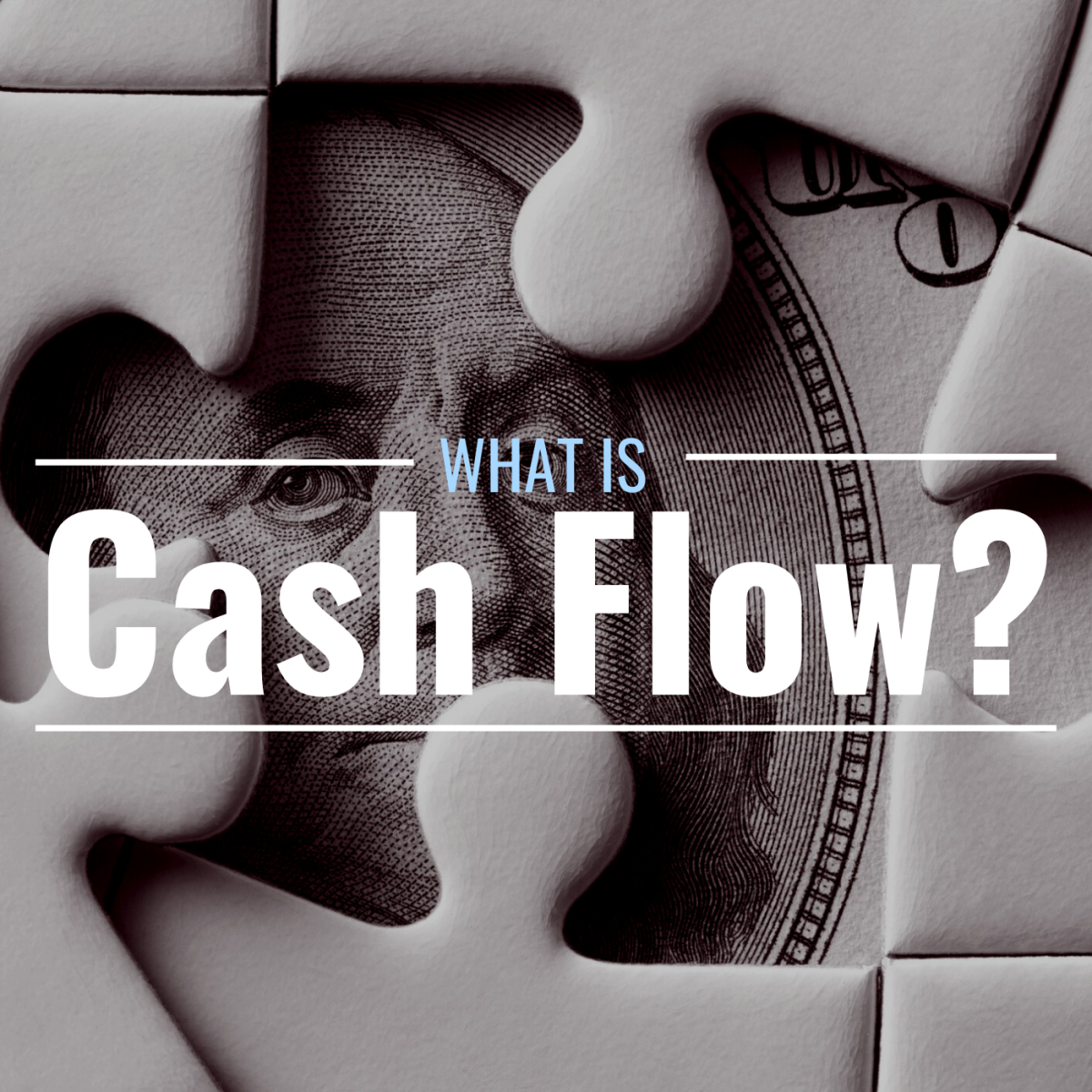 Puzzle pieces with the face of a $100 dollar bill peeking through with the text overlay "What Is Cash Flow?"