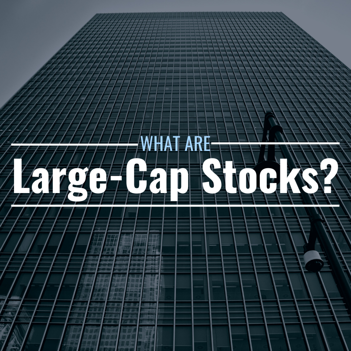 Image of a skyscraper with text overlay: "What Are Large-Cap Stocks?"