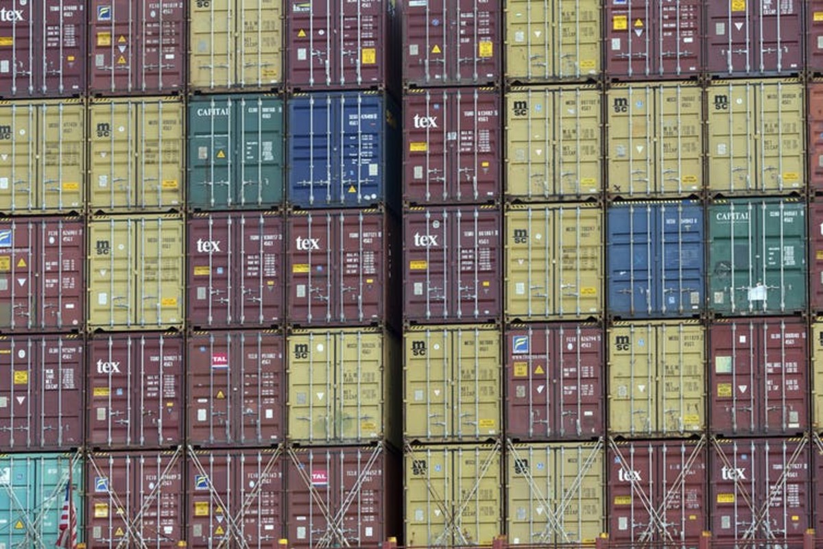 Standardized shipping containers like these 40-foot ones made globalization possible. AP Photo/Stephen B. Morton