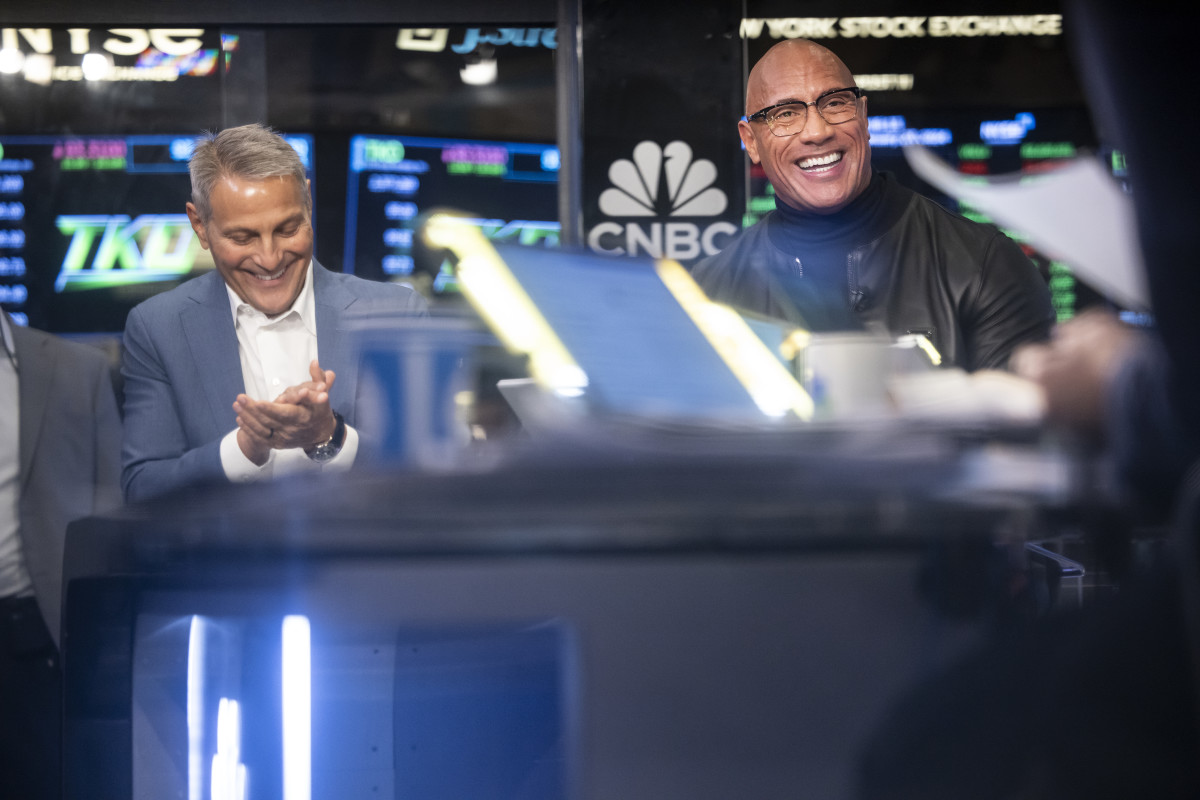 Dwayne "The Rock" Johnson is seen with TKO + Endeavor CEO Ariel Emanuel during a ceremony announcing Johnson has joined the Board of Directors for TKO at the New York Stock Exchange on January 23, 2024 in New York City.